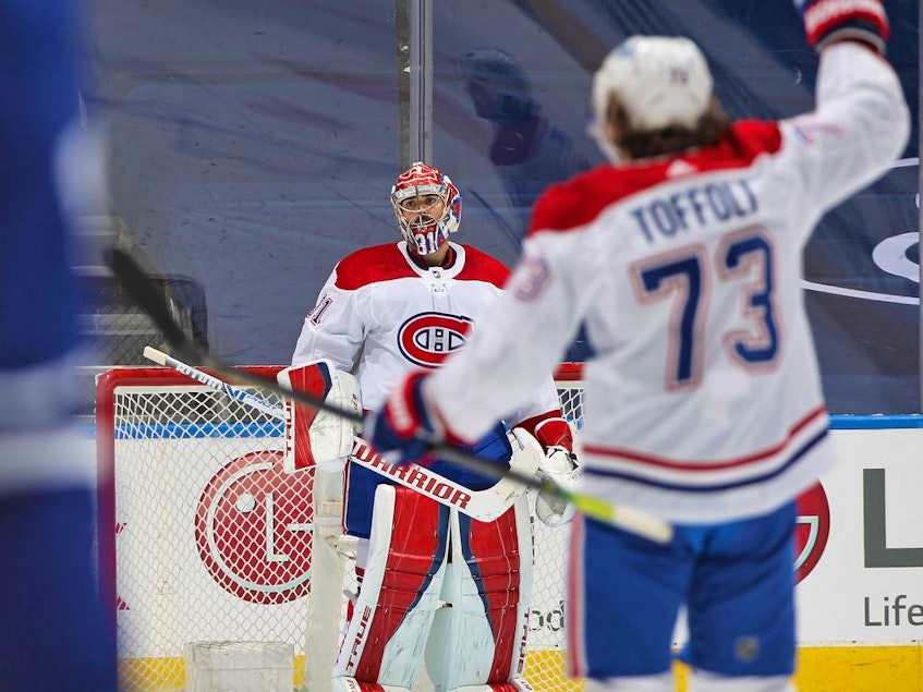 Canadiens goalie Carey Price leaves his net while teammate Tyler Toffoli looks on following 3-1 win over the Maple Leafs in Game 7 of first-round playoff series Monday night in Toronto. - Claus  Andersen