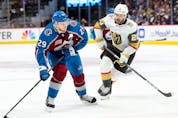 Nathan MacKinnon (left) of Colorado Avalanche looks for an opening on goal against Chandler Stephenson of the Vegas Golden Knights during the second period in Game One of the Second Round of the 2021 Stanley Cup Playoffs at Ball Arena on May 30, 2021 in Denver, Colorado.