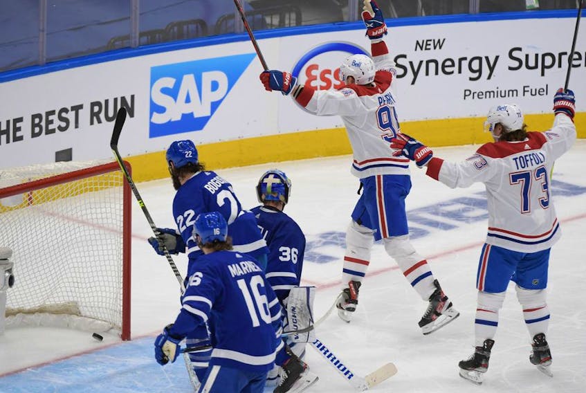Canadiens forward Corey Perry (94) celebrates after scoring against the Toronto Maple Leafs in Game 7 of the first round of the 2021 Stanley Cup Playoffs at Scotiabank Arena in Toronto on Monday, May 31, 2021.