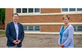 The centre will operate as usual from 8 a.m. to 8 p.m., seven days a week, and will offer financial assistance, counselling, employment, food and housing, said province officials. From left, Brad Trivers, minister of social development and housing, and Donna Keenan, reaching home co-ordinator for the John Howard Society.