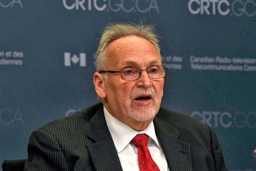 CRTC Chair Ian Scott is being accused of bias in his decision on internet wholesale rates.