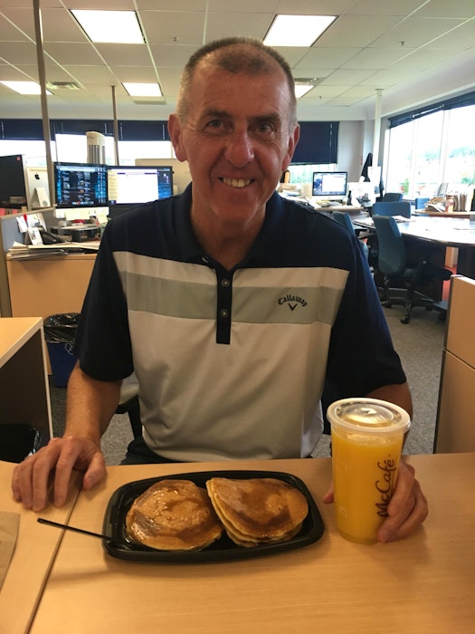 Sam McNeish enjoying pancakes at his desk in The Telegram's newsroom in 2019. - Telegram file photo