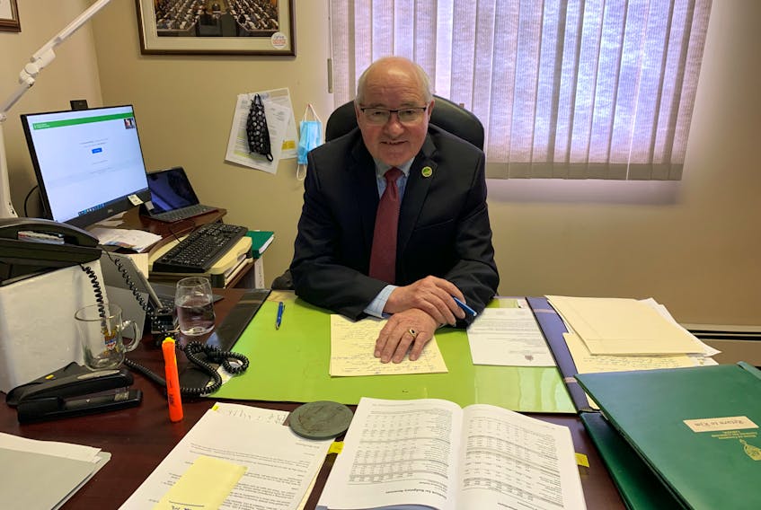 Malpeque MP Wayne Easter works at his constituency office in Hunter River on Tuesday. Easter, who has been an MP for 28 years announced on Monday that he will not run in the next federal election.