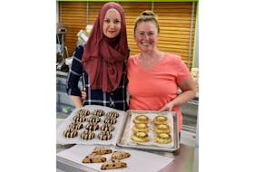 Jane Goode, the owner and operator of Bliss Bakery, and her sister-in-law and assistant baker Alma Krivdic, (left) spend their Wednesdays baking up plenty of keto delights out of a commercial kitchen in Hants County.