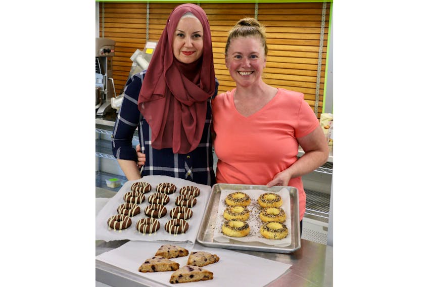Jane Goode, the owner and operator of Bliss Bakery, and her sister-in-law and assistant baker Alma Krivdic, (left) spend their Wednesdays baking up plenty of keto delights out of a commercial kitchen in Hants County.