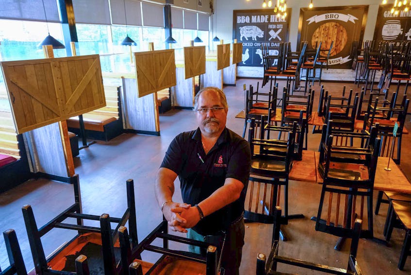 Bill Pratt, owner of Cheese Curds, Habaneros and other Chef Inspired restaurants, is seen in his empty Upstreet BBQ Brewhouse in Dartmouth Tuesday June 15, 2021. Pratt is hoping for a long term recovery plan as the province rolls into the second phase of their post COVID19 plan.