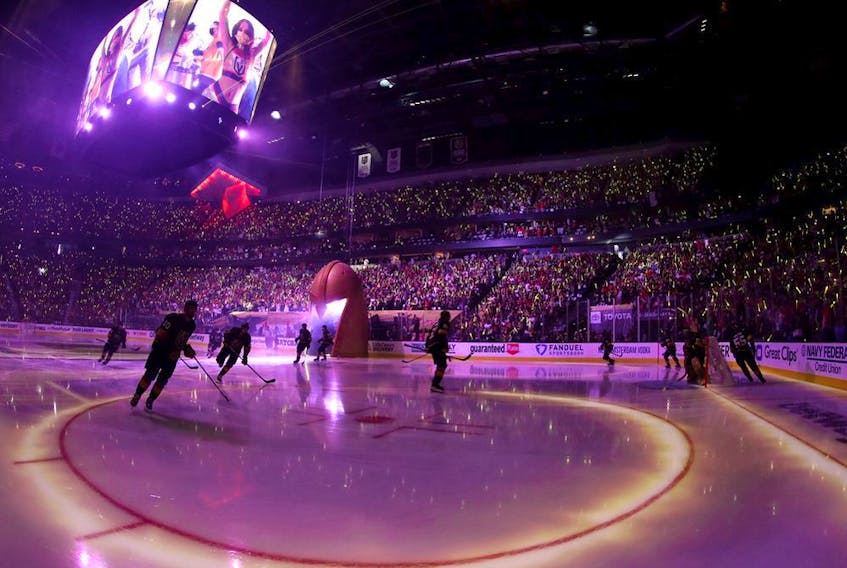 A fisheye lens image of the Vegas Golden Knights taking to the ice for Game 1 of the Stanley Cup Semifinals against the Montreal Canadiens at T-Mobile Arena on June 14, 2021 in Las Vegas.