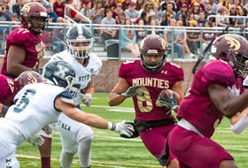 Mount Allison Mounties receiver Josh Hicks carries the ball against the defence of the St. Francis Xavier X-Men during a 2019 Atlantic university football regular-season game. - Dave Mathieson / Saltwire Network
