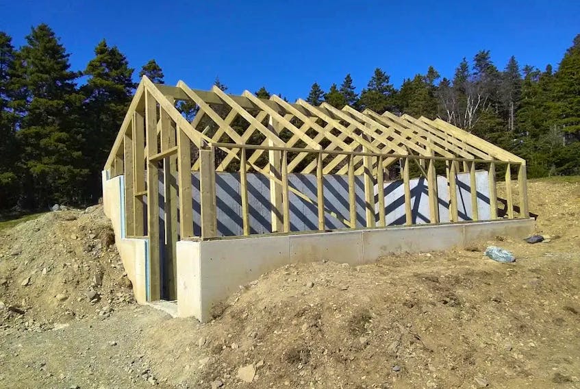 This photo shows an earth-sheltered greenhouse as it was under construction at O'Brien Farm in St. John's this spring. It's the sort of work that will be undertaken in seven communities across the province as part of the Food Producers Forum's Greenhouse Outreach Project. — Food Producers Forum