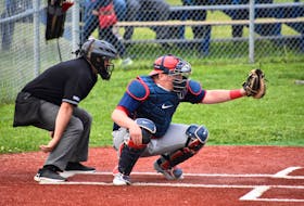 Sydney Sooners catcher Sean Ferguson, right, during a Nova Scotia Senior Baseball League game at the Susan McEachern Memorial Ball Park in Sydney in 2019. The senior baseball league anticipates its 2021 season will begin on July 6 in Halifax, pending the easing of COVID-19 restrictions. JEREMY FRASER • CAPE BRETON POST