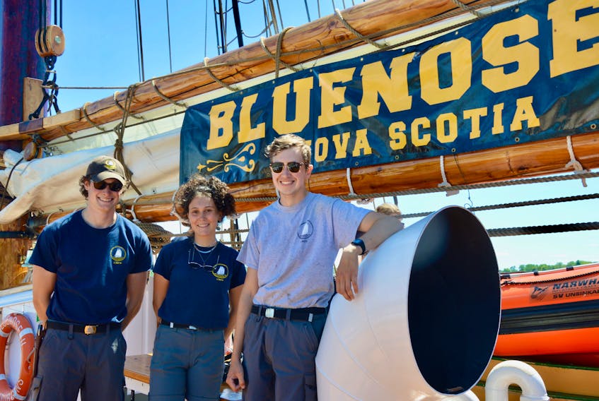 From left, Colin Campbell, Arianne Maillet and Will Taves are among the 18 crew members of Bluenose II that was docked at the Port of Sydney Thursday and Friday. Nova Scotia’s sailing ambassador is celebrating its 100th anniversary this year and will be making stops around the province, including Louisbourg today and Gabarus on Sunday. ELIZABETH PATTERSON/CAPE BRETON POST