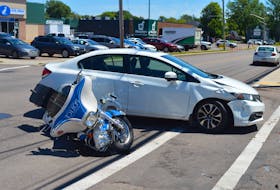 A collision involving a Charlottetown Police Services motorcycle and a white Honda Civic occurred on Friday, June 18, at the corner of Queen and Pond streets. Police had a section of Queen Street closed for the early part of the afternoon.