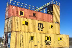 This stack of shipping containers has been turned into a training facility for the Corner Brook Fire Department. The project cost $76,740.74 more than budgeted for.