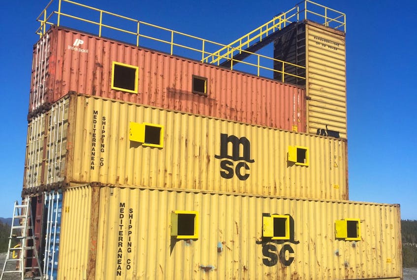 This stack of shipping containers has been turned into a training facility for the Corner Brook Fire Department. The project cost $76,740.74 more than budgeted for.