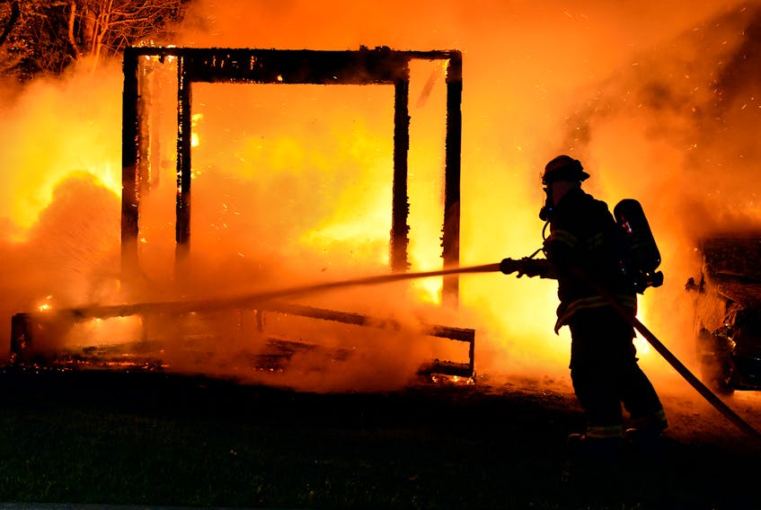 A shed and two cars were destroyed by fire early Wednesday morning in Mount Pearl. Keith Gosse/The Telegram