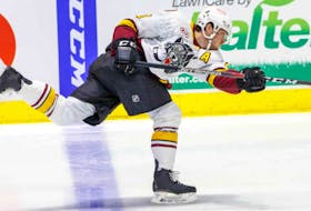 Cavan Fitzgerald, who played his under-18 hockey with the Cape Breton Unionized Tradesmen, takes a shot from the blueline during American Hockey League action with the Chicago Wolves during the 2020-21 season. Fitzgerald recently signed with the Carolina Hurricanes franchise. CONTRIBUTED • CHICAGO WOLVES