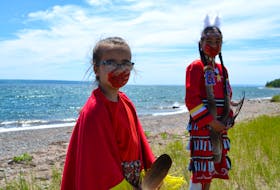 Piper McDonald, seven, and Leannah Joe, 10, take part in the video for the song "I Want to Rise," a song to honour missing and murdered Indigenous women and girls in Canada, written by band teacher Carter Chaisson and performed by Grade 12 student Emma Stevens. ARDELLE REYNOLDS/CAPE BRETON POST
