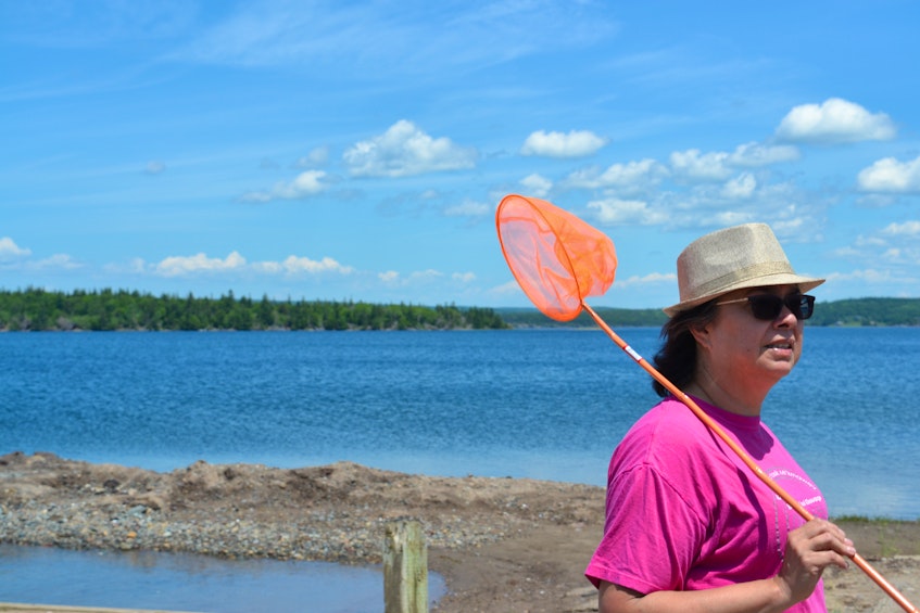Gwenn Brake works for Potlotek Fisheries and helped to organize the community cleanup along the shore of the Bras d'or for National Indigenous Peoples Day. ARDELLE REYNOLDS/CAPE BRETON POST - Ardelle Reynolds