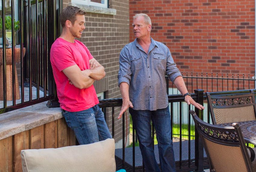 Inspect your deck yearly. Mike Jr. and Mike Holmes on a homeowners new deck during a reveal day.