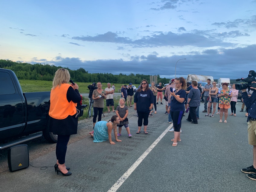 Cumberland North MLA Elizabeth Smith-McCrossin talks to protesters blocking Highway 104 at Exit 7 near Thomson Station, N.S., on Tuesday. - Darrell Cole