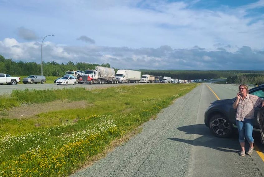 Vehicles block the westbound lane of the Trans-Canada Highway at Thomson Station near Oxford, N.S. on Tuesday afternoon. The blockage was in protest to Nova Scotia’s decision not to fully reopen the border with New Brunswick. Michael MacDonald photo