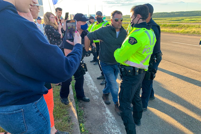 RCMP moved protesters off the highway ending a blockade of the Trans-Canada Highway at the Nova Scotia border on Wednesday night