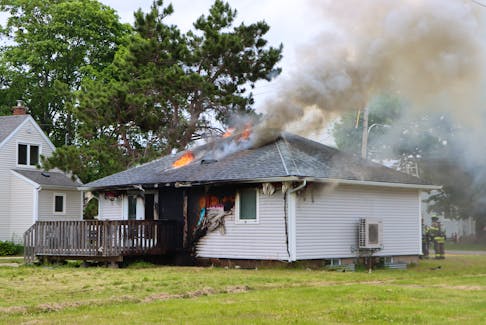 Firefighters battled a blaze in this residential housing unit at 14 Wing Greenwood on June 19. – Adrian Johnstone