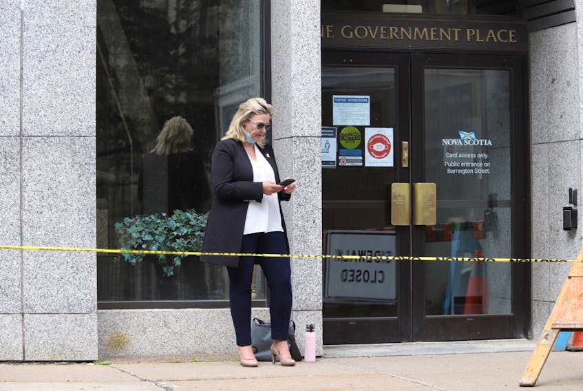 Cumberland North PC MLA Elizabeth Smith-McCrossin stands outside One Government Place in downtown Halifax on Wednesday morning, June 23, 2021, hoping to meet with Nova Scotia Premier Iain Rankin to convince him to lift travel restrictions between the province and New Brunswick.