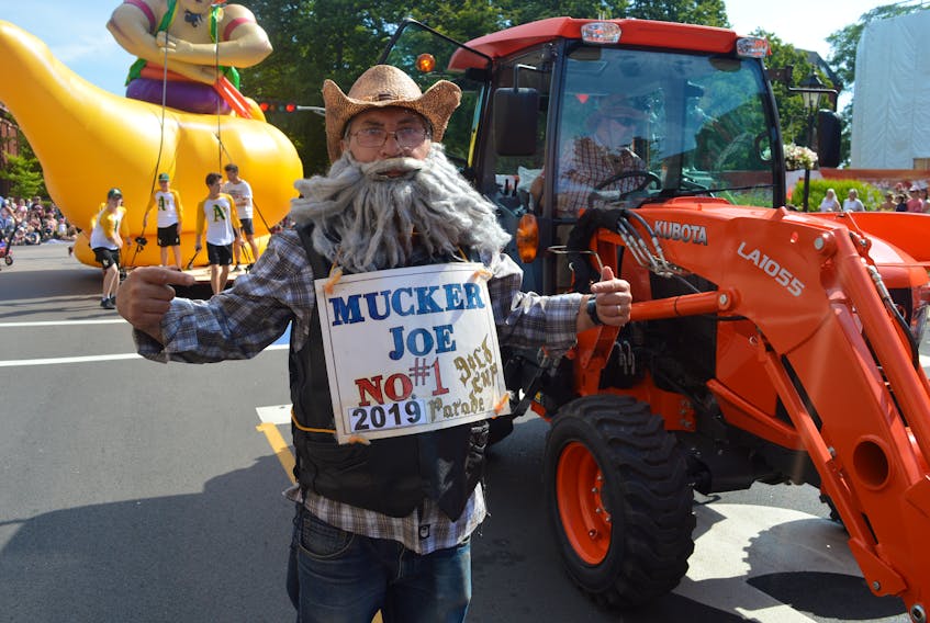 Mucker Joe, who helps clean up after the horses in the Gold Cup Parade. Filed photo. 
