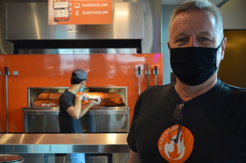 Irwin Dawson, right, helped bring the Blaze Pizza chain to Charlottetown. It opened at the corner of University Avenue and Belvdedere Avenue on June 22. - Dave Stewart
