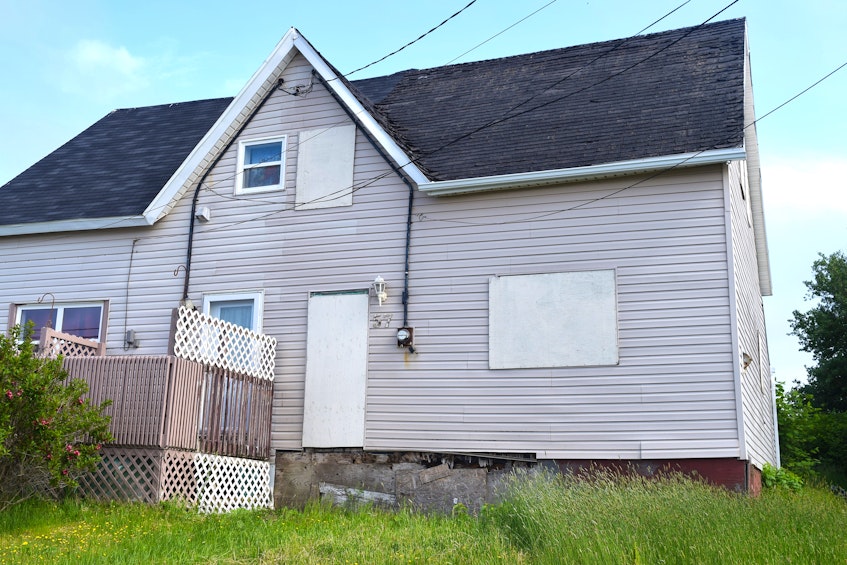 Half of a boarded up company house at 57 Church St. in Dominion is currently on the Cape Breton Regional Municipality property tax sale with $4,095.86 owing. Sharon Montgomery-Dupe • Cape Breton Post - Sharon Montgomery