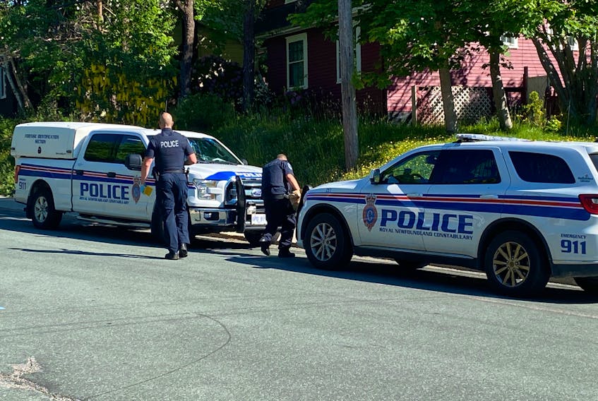 The Royal Newfoundland Constabulary's forensic identification unit was among several vehicles and officers at Cowan Avenue home in St. John's on Friday morning, June 25.