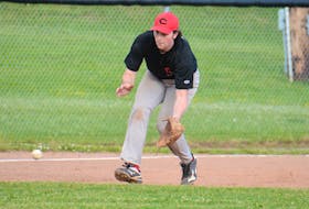 Morell Chevies third baseman Ben MacDougall charges a ground ball during Kings County Baseball League action Wednesday, June 23, at Memorial Field in Charlottetown.