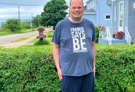 Frankie MacDonald poses for a photo outside his home in Whitney Pier. The YouTube sensation recently celebrated the 10th anniversary of his first video. Chris Connors • Cape Breton Post