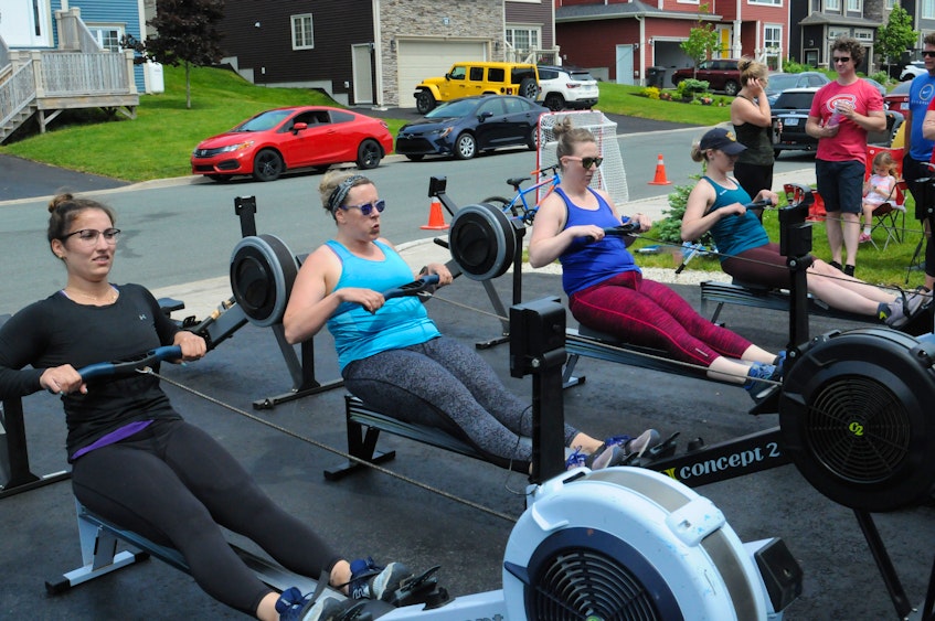  Among those who aided in Derek McDonald’s cause were members of the Cahill Group senior ladies rowing team (from left), Courtney Langmead, Lindsay Holwell, Danielle Barron and Stephanie O’Quinn. — Joe Gibbons/The Telegram