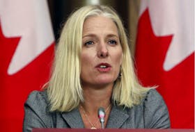 Catherine McKenna, Canada's infrastructure and communities minister, speaks during a news conference in Ottawa in October 2020. 
