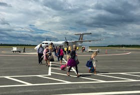 Passengers disembark the first PAL Airlines flight between St. John's, N.L. and Fredericton, N.B. (PAL Facebook photo)