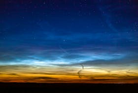 Noctilucent clouds are cloud-like phenomena that occur in the upper atmosphere during the summer. They are actually ice crystals that form in the mesospheric layer of our atmosphere and can only be seen at night. They are only visible when an observer and the lower layers of the atmosphere are in the Earth's shadow, and the clouds are still illuminated by the sun. 