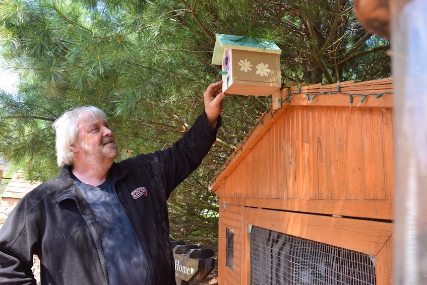North River resident Mark Lindsay has made over 400 birdhouse kits to distribute to children as a way to ease the pain of losing his daughter Chantelle and brings smiles to the faces of others. - Harry Sullivan