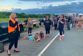 Cumberland North MLA Elizabeth Smith-McCrossin speaks during a blockade on Highway 104 at Thomson Station on Tuesday, June 22. The blockade, which lasted just over five hours, followed an announcement earlier that day by Premier Iain Rankin not to reopen the border to New Brunswick residents, and Nova Scotia residents returning from New Brunswick, without the need to self-isolate. Another blockade later closed traffic at the border for more than 24 hours before RCMP ended it Wednesday night, June 23.