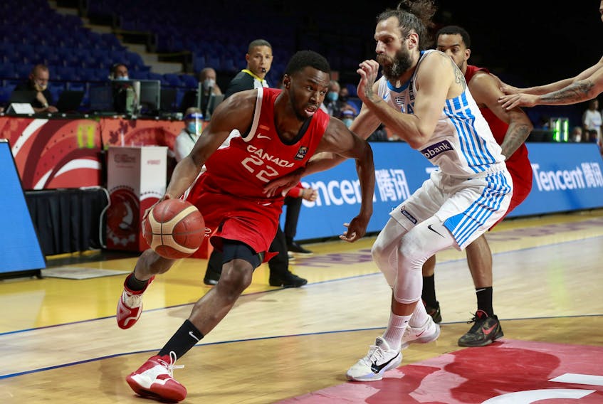 Andrew Wiggins makes a move against a Greek player during Olympic qualifying in Victoria, B.C. on Tuesday, June 29, 2021. Wiggins led the way for Canada with  led Canada with 23 points in the home side's victory. 