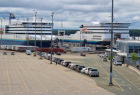 A Marine Atlantic ferry with vehicles lined up at the terminal in North Sydney. The Newfoundland and Labrador Supreme Court has upheld the provincial government decision last year to implement travel restrictions under the Public Health Act.