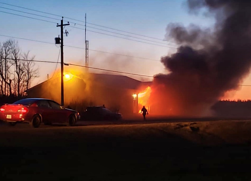 Flames come out of the front of the Shinimicas Fire Department during a fire there on April 24,2020. Darren Fisher photo - Contributed