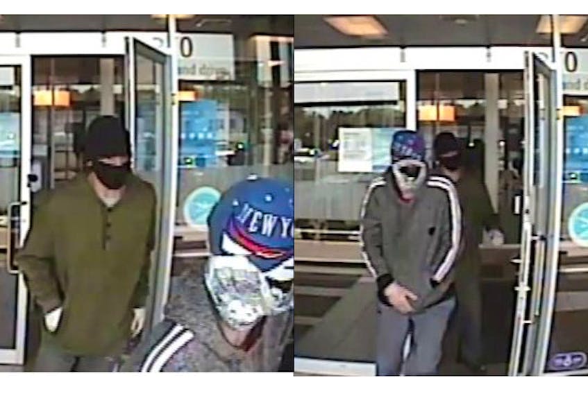 The Royal Newfoundland Constabulary has released these images of suspects wanted in connection with a mid-Monday bank robbery in St. John's.