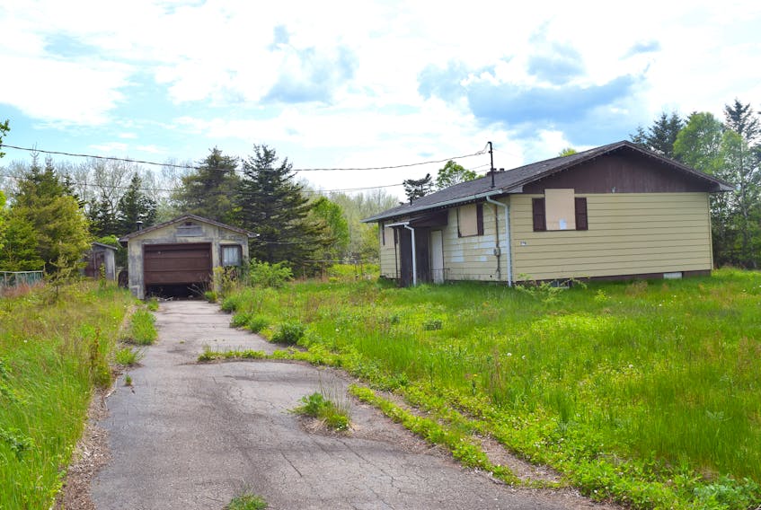 This house on Cameron's Lane, New Victoria is one of 17 unsightly properties the Cape Breton Regional Municipality will demolish this month. Sharon Montgomery-Dupe • Cape Breton Post