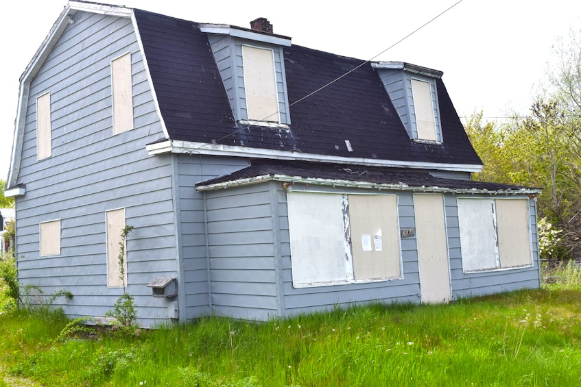 This house on Roaches Road, New Waterford is one of 17 unsightly structures scheduled for demolition this month. Sharon Montgomery-Dupe • Cape Breton Post - Sharon Montgomery