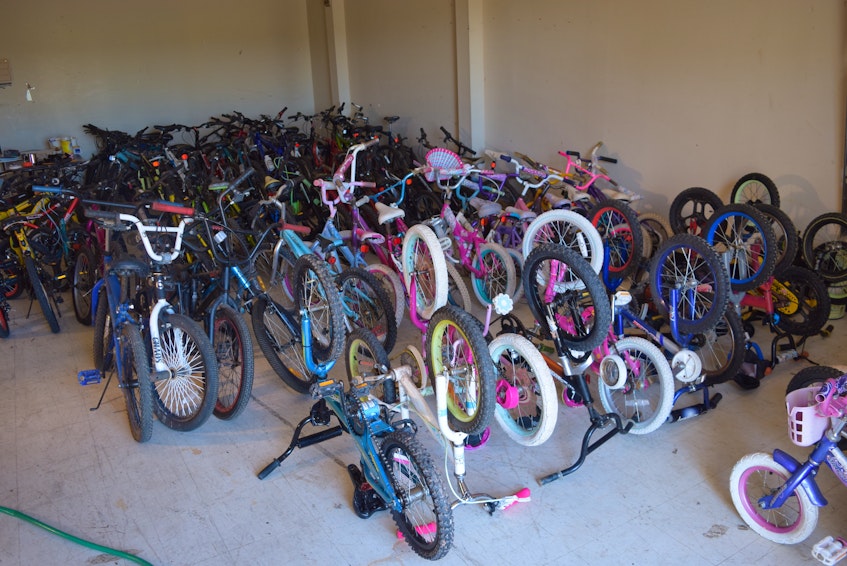 The bikes are sorted by size, and registrants are matched with a bike that fits. - Chelsey Gould