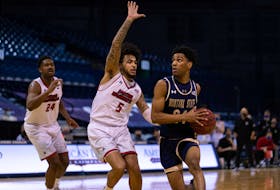 Dartmouth's Kellen Tynes, right, goes to the hoop in a game for Montana State against Eastern Washington. - Montana State University.