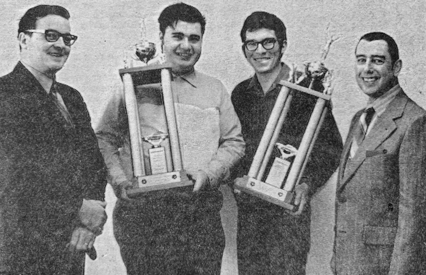James Anthony, motor vehicle repair teacher, students John Lattie and Stephen Swinamer, and Bernard Fetter, the principal of the Hants Regional Vocational School, were all smiles in 1971 when the young men won a Chrysler of Canada Limited sponsored contest that tested their knowledge and mechanical skills.  - File Photo