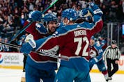  Colorado Avalanche center Alex Newhook (18) celebrates the goal of right wing Joonas Donskoi (72) in the second period against the Vegas Golden Knights in Game 5 of their second-round playoff game at Ball Arena on Tuesday, June 8, 2021.
